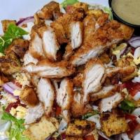 Crispy Chicken Salad 3Po · Romaine lettuce topped with crispy chicken, tomatoes, bacon, cheddar cheese, red onions, egg...