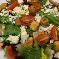 Kristof Salad 3Po · Romaine lettuce topped with dried cranberries, garbanzo beans, feta cheese, grape tomatoes, ...