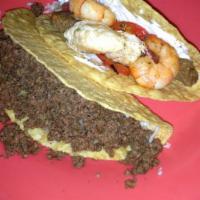Sriracha Shrimp Tacos (3) · Three tacos with grilled shrimp tossed with honey sriracha sauce. Topped with onions and cil...