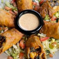 Southwest Eggrolls · Infused with flavor, this take on our favorite app features smoked chicken breast, spinach, ...