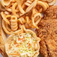 Grouper Dinner · Your choice of grilled or fried grouper, in a basket with curly fries, coleslaw and garlic b...