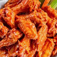 Large (24) Bone-In Wings · Our Fresh wings are served with celery, carrots and your choice of made-from-scratch bleu ch...