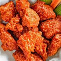 Medium (12) Boneless Wings · Our Fresh wings are served with celery, carrots and your choice of made-from-scratch bleu ch...