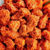 Jumbo (48) Boneless Wings · Our Fresh wings are served with celery, carrots and your choice of made-from-scratch bleu ch...