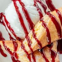 Fried Cheesecake · Sweet New York Style cheesecake wrapped in a flour tortilla and fried to a golden brown. Ser...
