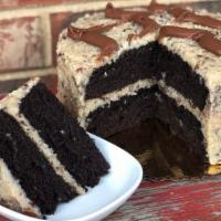 German Chocolate Cake · Moist Devil's Food Chocolate Cake Layers covered in McEntyre's hand stirred, stove cooked Ge...