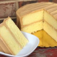 Old Fashioned Caramel Cake · Moist yellow cake layers covered in creamy caramel Icing, eight inch diameter, two layers, s...