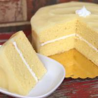 Lemon Cream Cake · Yellow layer cake filled with McEntyre's scratch made vanilla buttercream icing, covered wit...