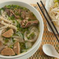 Pho Combo · white noodles served with bean sprouts, basil leaves, cilantro, green onions, jalapeno, lime...