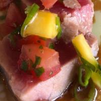 Seared Tuna Plate · Tropical fruit salsa and soy yuzu.

Consuming raw or undercooked meat, poultry, seafood or e...
