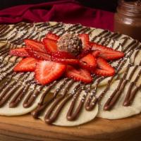 Nutella Crepaccio · Mini pancakes, Nutella, strawberry, and ferrero rocher chocolate.