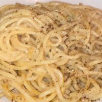 Cacio E Pepe · Long pasta. Spaghetti, pecorino romano, cracked black pepper