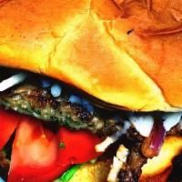 Bakari'S Burger · Plant based burger, caramelized onions, spinach, vegan cheese, Wakanda sauce, and sweet pota...