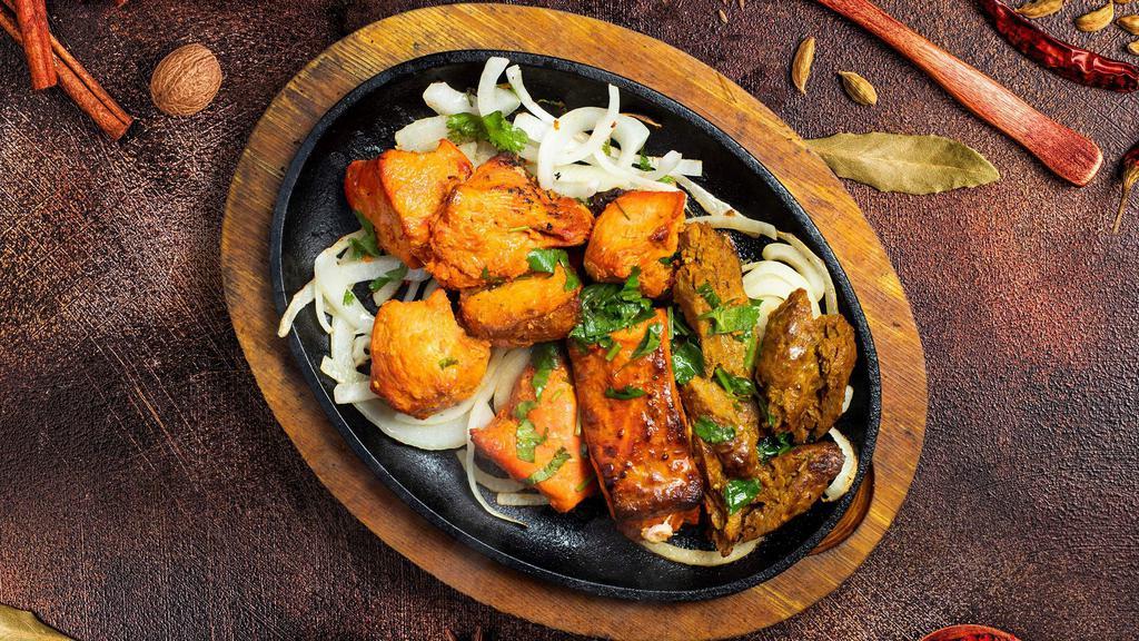 Tandoori Union · A combination of chicken tandoori, shrimp tandoori, paneer tikka kabab, chicken mint kabab, chicken tikka kabab, lamb-boti kabab, chicken swiss kabab, and goat boti kabab.