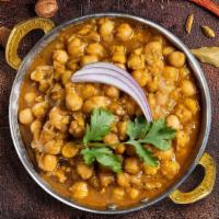Chunky Chana Masala · Chickpeas cooked in a tomato and onion gravy with Indian spices.