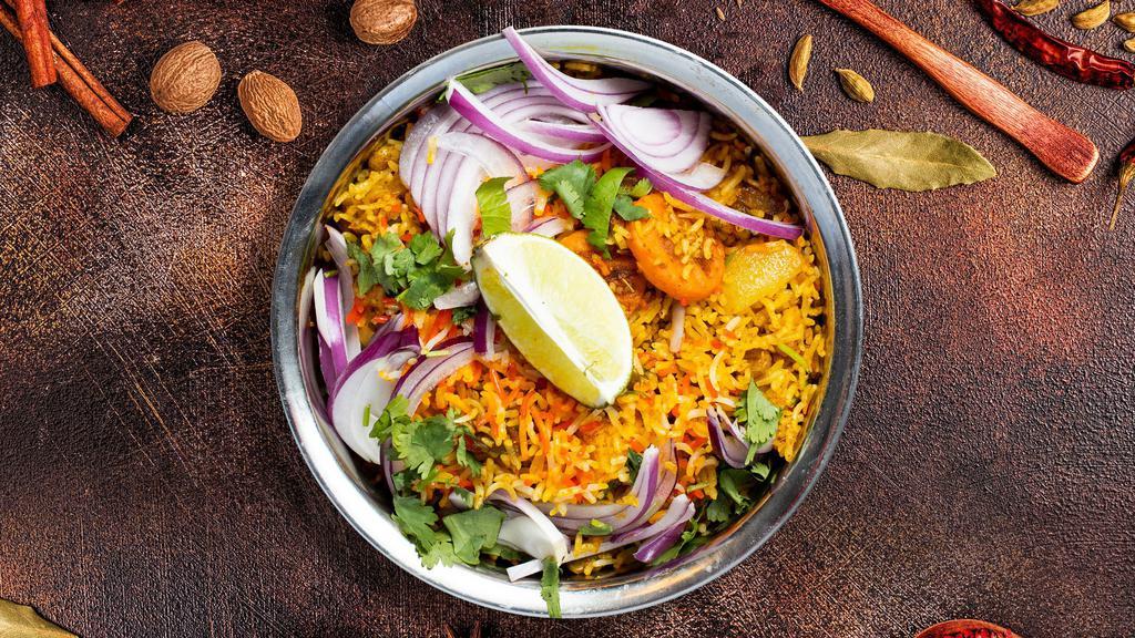Veggie Biryani Cabinet · Spiced seasoned vegetables cooked with Indian spices and basmati rice.