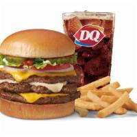 Two Cheese Deluxe 1/2Lb* Triple Combo · A Signature Stackburger with three 100% seasoned real beef patties, topped with perfectly me...