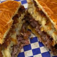 Mac Daddy Burger · 1/2 lb fried Mac and Cheese patty on top of our 1/3 lb burger patty with double the guava sa...