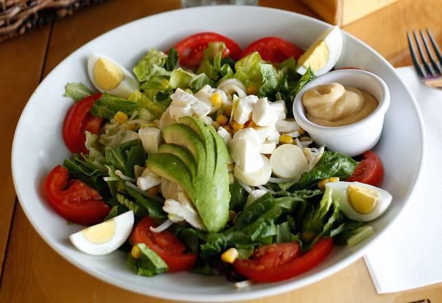 D'Annunzio Salad · Mixed greens, tomatoes, corn, palm of hearts, bean sprouts, fresh mozzarella, avocado and eggs.