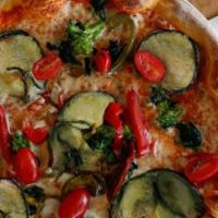 Ortomisto · Tomato sauce, mozarrela, roasted zucchini, sweet peppers, spinach, sauteed broccolini, and r...