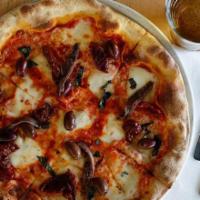 Napoli (106) · Anchovies, fresh mozzarella, black pitted olives, sun dried tomatoes, basil, tomato sauce an...