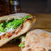 Vegetarian Sandwich · Arugula, cherry tomatoes, burrata, mushrooms and olives.
