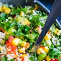 Healthy Quinoa Salad · Base of Quinoa, with chickpeas, bell peppers, cucumbers, parsley, and lemon.