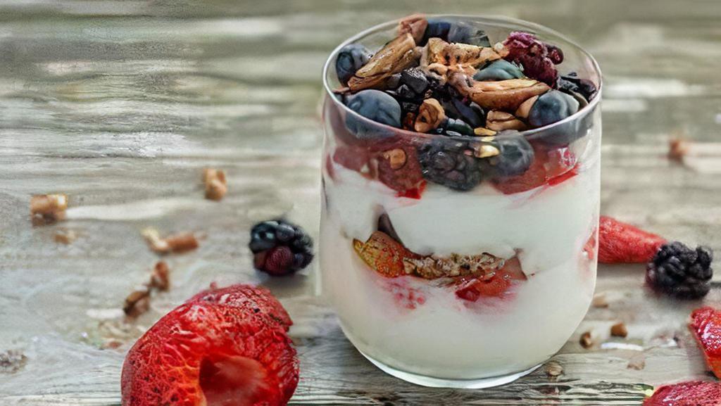 Mixed Berry Yogurt Parfait · 12 Oz vanilla yogurt with strawberries, blackberries, blueberries, and raspberries and granola.