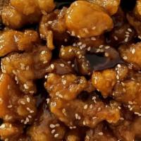 Sesame Chicken · Served with fried rice & egg roll or can soda.