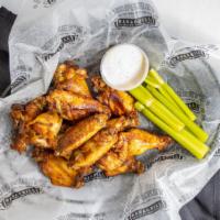 Jumbo Smoked Chicken Wings · Choice of Naked, Medium, or Hot with Celery & White BBQ Sauce.