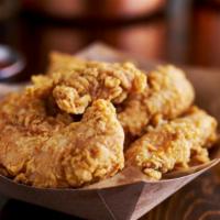 Chicken Tenders · Eight pieces of fresh fried white chicken meat tenders.