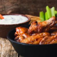 Chicken Wings · Fresh oven-baked chicken wings. Served with customers sauce.