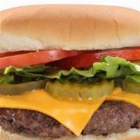 Big Americana Burger · 5.5 ounces of beef, mayo, lettuce, tomato, pickles & American cheese.