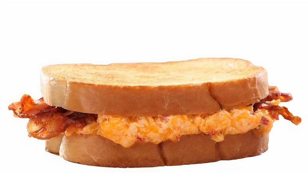 Toasted Pimento Cheese & Bacon · House-made pimento cheese with bacon, on sourdough bread..