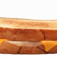 Grilled Cheese · Like Mom used to make. Grilled sourdough bread with American and Provolone cheese..