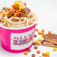 Go Nuts · Reese's cups, peanut butter ice cream, topped with reese's pieces and cups.
