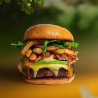 Locked And Loaded Vegan Burger  · Seasoned beyond patty topped with fries, avocado, melted vegan cheese, onion, lettuce, tomat...
