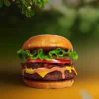 The New Classic Vegan Burger  · Seasoned beyond patty topped with lettuce, tomato, onion, and pickles. Served on a warm bun....