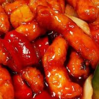 02 Sweet & Sour Chicken - 酸甜鸡 · Pollo Agridulce
- Served with a Pint of steamed rice.