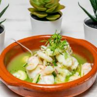 Aguachile De Camarón · Shrimp, cucumber-cilantro habanero marinated, red onions, avocado, cucumber slices, and micr...