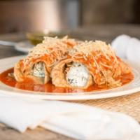Eggplant Rollatino · Vegetarian. Eggplant rolled and filled with Ricotta cheese, spinach, and laced with tomato s...