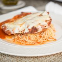 Parmigiana · Breaded, topped with marinara sauce, and mozzarella cheese, over pasta.