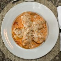 Rollata · Baked homemade pasta with a filling of sausage, beef, veal, and topped with mozzarella chees...