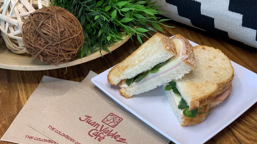 Ham And Provolone Cheese Sandwich · Delicious sandwich made with rustic bread, Virginia ham, provolone cheese, mayonnaise, and arugula.