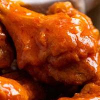 10Pc Wing And Fries · sousvide wings then fried tossed in sauce of your choice 
( buffalo ,honey hot,  garlic parm...