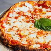 Margherita Pizza · Organic Italian tomatoes, fresh mozzarella, fresh basil.