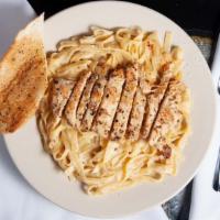 Fettuccini Alfredo · Made with our homemade alfredo sauce, served with garlic bread. Add chicken or broccoli, or ...