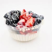 Psyched Coconut Bowl · Blueberries, Blackberries, Strawberries, Condensed Milk, Goji Berries