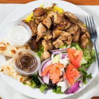 Chicken Gyro Plate · Sliced grilled chicken breast served over rice with a side greek salad & pita and homemade t...