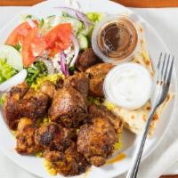 Chicken Shish Kabob Plate (2 Kabobs) · Served over rice with a side greek salad & pita and homemade tzatziki sauce.